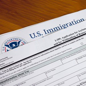 U.S. immigration and asylum application on a table - Phillip A. Roach Attorney At Law